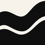 681a2e5a1cde7_Motif2 1 A black and white picture of a wave